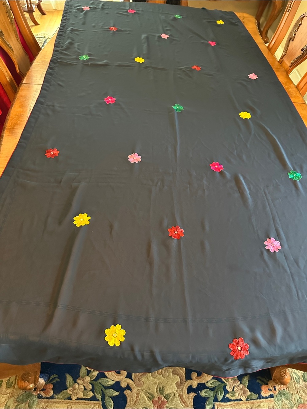 Navy Fabric with Red , yellow, pink and green Floral Embroidery Accent